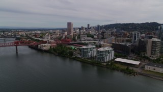 DX0001_013_003 - 5.7K aerial stock footage of Broadway Bridge and waterfront condos, Pearl District, Downtown Portland, Oregon