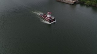 DX0001_013_004 - 5.7K aerial stock footage tracking a tugboat in the river, North Portland, Oregon