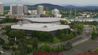 DX0001_013_020 - 5.7K aerial stock footage of Moda Center and Veterans Memorial Coliseum, sunset, Northeast Portland, Oregon