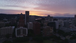 DX0001_014_030 - 5.7K aerial stock footage approaching and flying by the downtown skyline at twilight in Downtown Portland, Oregon