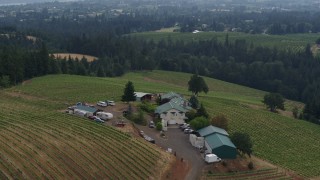 DX0001_015_028 - 5.7K aerial stock footage of vineyards and winery on a hilltop, Hood River, Oregon