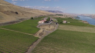 DX0001_018_004 - 5.7K aerial stock footage of orbiting the Maryhill Winery and vineyards in Goldendale, Washington