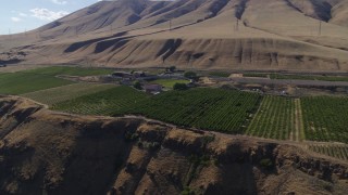 DX0001_018_014 - 5.7K aerial stock footage of the cliffside Maryhill Winery and vineyards in Goldendale, Washington