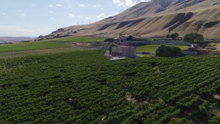 DX0001_018_018 - 5.7K aerial stock footage of an approach to the Maryhill Winery and amphitheater in Goldendale, Washington