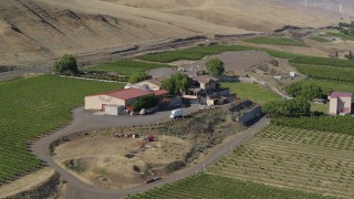 DX0001_018_024 - 5.7K aerial stock footage of approaching buildings at the Maryhill Winery in Goldendale, Washington
