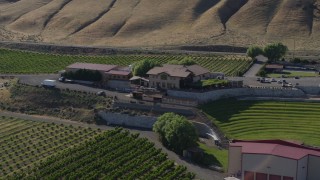 DX0001_018_027 - 5.7K aerial stock footage of flying around the buildings and amphitheater at the Maryhill Winery in Goldendale, Washington