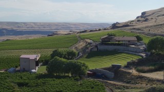 DX0001_018_037 - 5.7K aerial stock footage of orbiting the Maryhill Winery and amphitheater in Goldendale, Washington