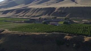 DX0001_019_008 - 5.7K aerial stock footage orbit the Maryhill Winery, amphitheater, and vineyard while ascending in Goldendale, Washington
