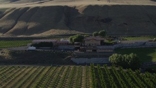 DX0001_019_024 - 5.7K aerial stock footage approach and fly over the Maryhill Winery main building in Goldendale, Washington