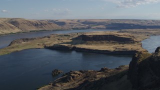 DX0001_019_026 - 5.7K aerial stock footage pan across Miller Island and the Columbia River in Goldendale, Washington