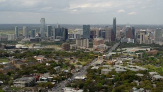 DX0002_103_023 - 5.7K aerial stock footage wide view of Congress Avenue leading to city's skyline in Downtown Austin, Texas