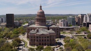 DX0002_107_001 - 5.7K aerial stock footage of orbiting the Texas State Capitol in Downtown Austin, Texas