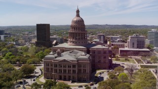 DX0002_107_002 - 5.7K aerial stock footage of slowly orbiting the Texas State Capitol in Downtown Austin, Texas