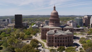 DX0002_107_003 - 5.7K aerial stock footage slowly orbit the Texas State Capitol in Downtown Austin, Texas