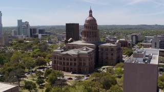 DX0002_107_024 - 5.7K aerial stock footage flyby government office building, approach Texas State Capitol in Downtown Austin, Texas