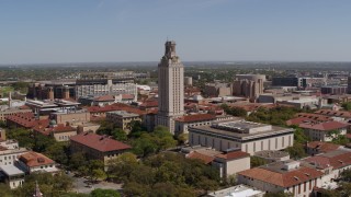DX0002_107_034 - 5.7K aerial stock footage of a slow orbit around UT Tower at the University of Texas, Austin, Texas