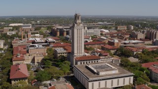 DX0002_107_035 - 5.7K aerial stock footage of a reverse view of UT Tower at the University of Texas, Austin, Texas