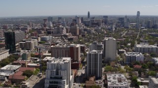 DX0002_107_038 - 5.7K aerial stock footage of approaching the city's skyline from the University of Texas campus, Downtown Austin, Texas
