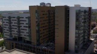 DX0002_107_048 - 5.7K aerial stock footage of orbiting an apartment building in Austin, Texas