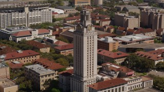 DX0002_108_003 - 5.7K aerial stock footage ascend and circle the UT Tower at the University of Texas, Austin, Texas