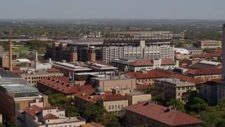 DX0002_108_014 - 5.7K aerial stock footage of the football stadium at the University of Texas, Austin, Texas