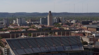 DX0002_108_028 - 5.7K aerial stock footage UT Tower seen from the football stadium at the University of Texas, Austin, Texas