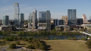 DX0002_109_012 - 5.7K aerial stock footage approach and flyby The Northshore skyscraper on the other side of Lady Bird Lake, Downtown Austin, Texas