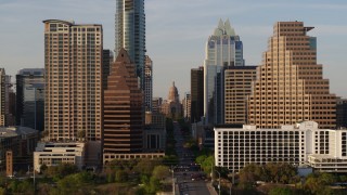 DX0002_109_039 - 5.7K aerial stock footage of downtown skyscrapers, reveal the state capitol in Downtown Austin, Texas