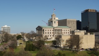 DX0002_113_035 - 5.7K aerial stock footage low altitude orbit of the Tennessee State Capitol building in Downtown Nashville, Tennessee