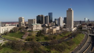 DX0002_114_006 - 5.7K aerial stock footage reverse view of the Tennessee State Capitol, skyscrapers, Tennessee Tower in Downtown Nashville, Tennessee