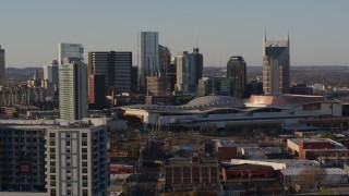 DX0002_114_042 - 5.7K aerial stock footage stationary view of city's tall skyline, Nashville Music City Center in Downtown Nashville, Tennessee