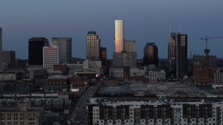 DX0002_115_019 - 5.7K aerial stock footage ascend with a view of the city's skyline at twilight in Downtown Nashville, Tennessee