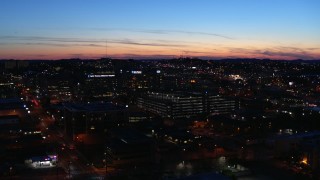 DX0002_115_045 - 5.7K aerial stock footage slowly orbit a hospital complex at twilight, Nashville, Tennessee