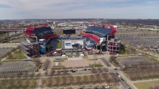 DX0002_117_011 - 5.7K aerial stock footage reverse view of Nissan Stadium during ascent in Nashville, Tennessee