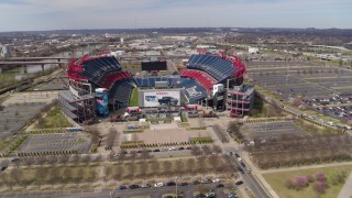 DX0002_117_012 - 5.7K aerial stock footage circling around Nissan Stadium in Nashville, Tennessee