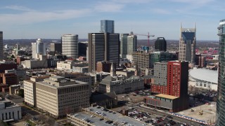DX0002_118_005 - 5.7K aerial stock footage of approaching a high-rise hotel in Downtown Nashville, Tennessee