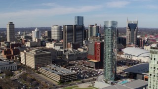 DX0002_118_013 - 5.7K aerial stock footage orbit the JW Marriott hotel, skyscrapers in background in Downtown Nashville, Tennessee