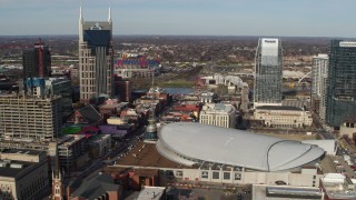DX0002_119_011 - 5.7K aerial stock footage of AT&T Building, Broadway and Bridgestone Arena, Downtown Nashville, Tennessee