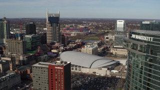 DX0002_119_013 - 5.7K aerial stock footage of AT&T Building, Bridgestone Arena, Pinnacle skyscraper, reveal JW Marriott hotel, Downtown Nashville, Tennessee