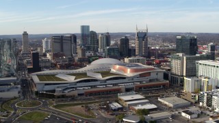 DX0002_119_018 - 5.7K aerial stock footage of city skyline and Nashville Music City Center, Downtown Nashville, Tennessee