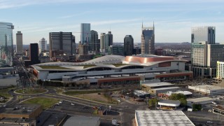 DX0002_119_025 - 5.7K aerial stock footage reverse view of Nashville Music City Center and city's skyline, Downtown Nashville, Tennessee