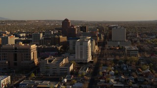 DX0002_122_025 - 5.7K aerial stock footage of high-rise office buildings behind courthouse in Downtown Albuquerque, New Mexico