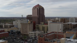 DX0002_127_001 - 5.7K aerial stock footage of the Albuquerque Plaza office building, Downtown Albuquerque, New Mexico