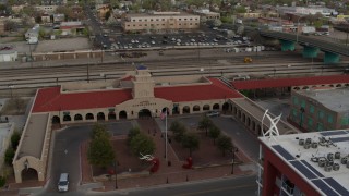 DX0002_127_020 - 5.7K aerial stock footage of an orbit of the entrance of the Albuquerque train station, Downtown Albuquerque, New Mexico