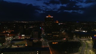 DX0002_128_047 - 5.7K aerial stock footage orbit office high-rise and hotel at twilight, Downtown Albuquerque, New Mexico
