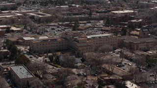 DX0002_129_035 - 5.7K aerial stock footage orbiting a hotel in the city's downtown area, Santa Fe, New Mexico