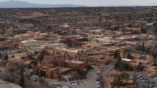 DX0002_130_027 - 5.7K aerial stock footage of orbiting two hotels in Santa Fe, New Mexico