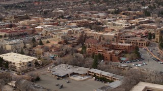 DX0002_130_035 - 5.7K aerial stock footage approach shops and downtown hotels in Santa Fe, New Mexico