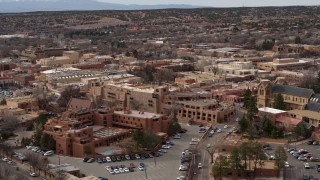 DX0002_130_038 - 5.7K aerial stock footage approach and flyby downtown hotels in Santa Fe, New Mexico
