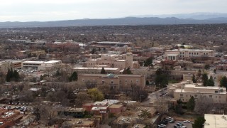 DX0002_130_041 - 5.7K aerial stock footage of a reverse view of the Bataan Memorial Building in Santa Fe, New Mexico
